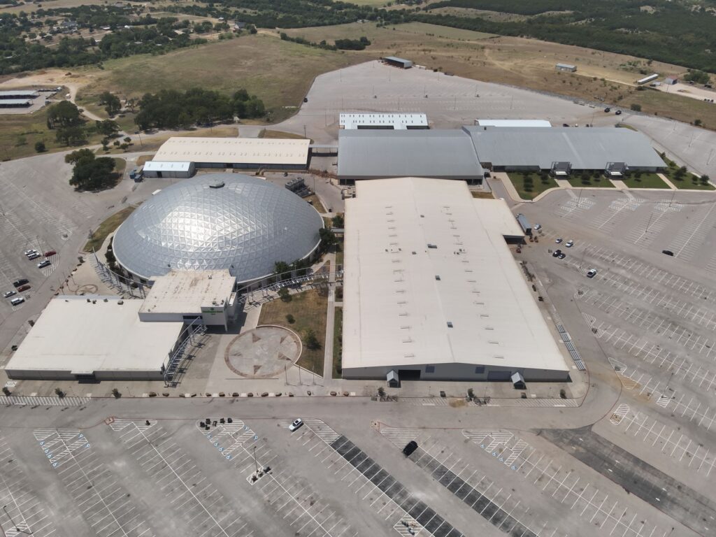 Aerial view of the Huntington Bank Expo with its silver dome and exhibition halls in Belton, Texas